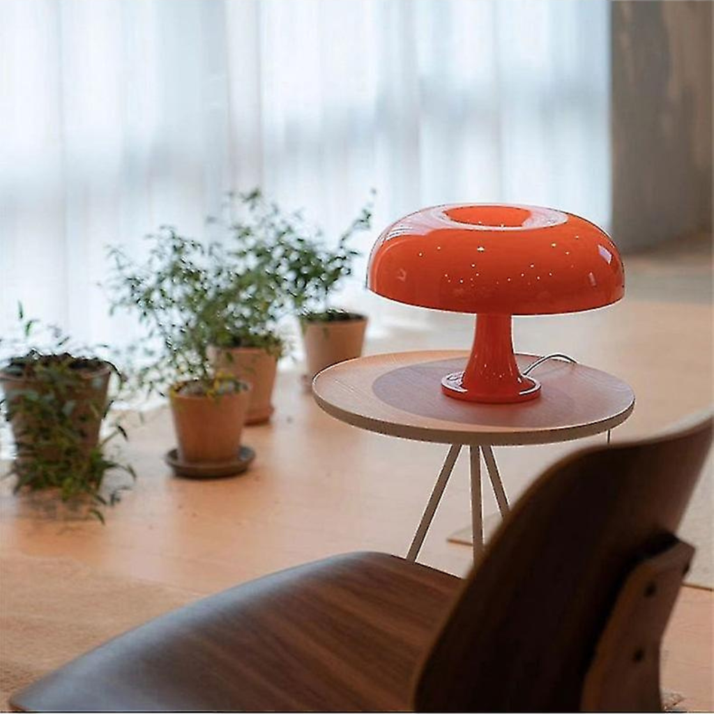 orange mushroom lamp on table