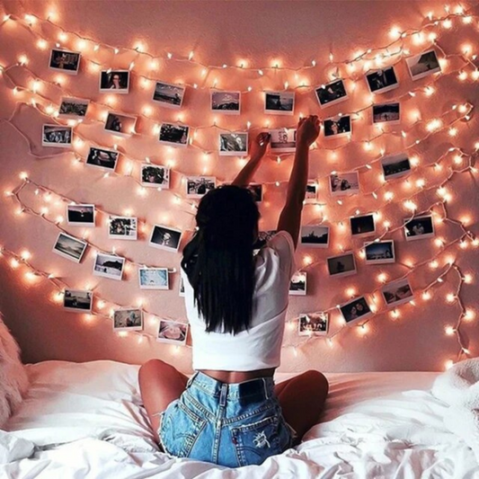 women hanging Photo Clip String Lights