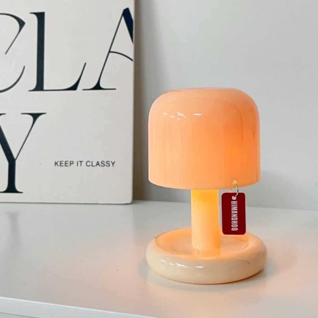 Mini desk lamp on a shelf