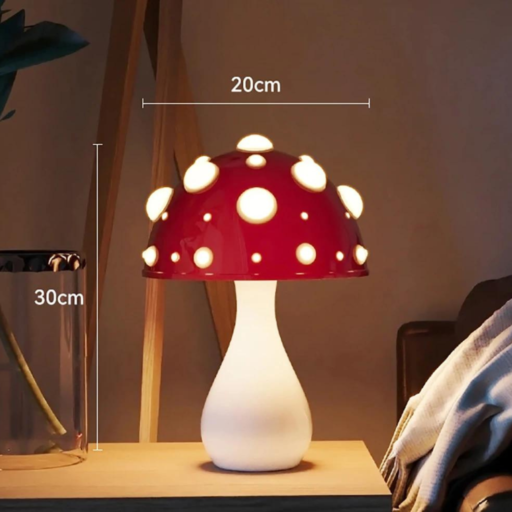 Red capped mushroom lamp on bed side table